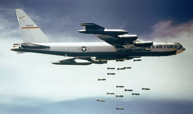 A B-52F nicknamed “Casper The Friendly Ghost” from the 320th Bomb Wing drops Mk 117 750 lb bombs over Vietnam circa 1965 (US Air Force)